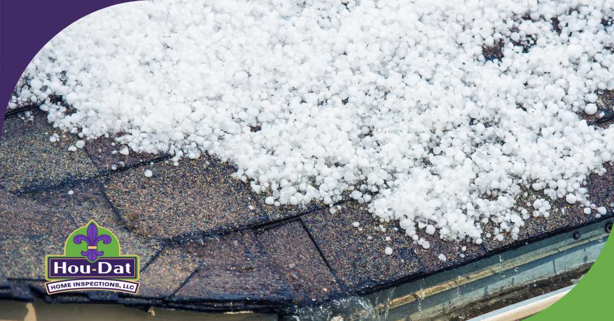 Hail accumulation on a roof with water runoff from the gutter.