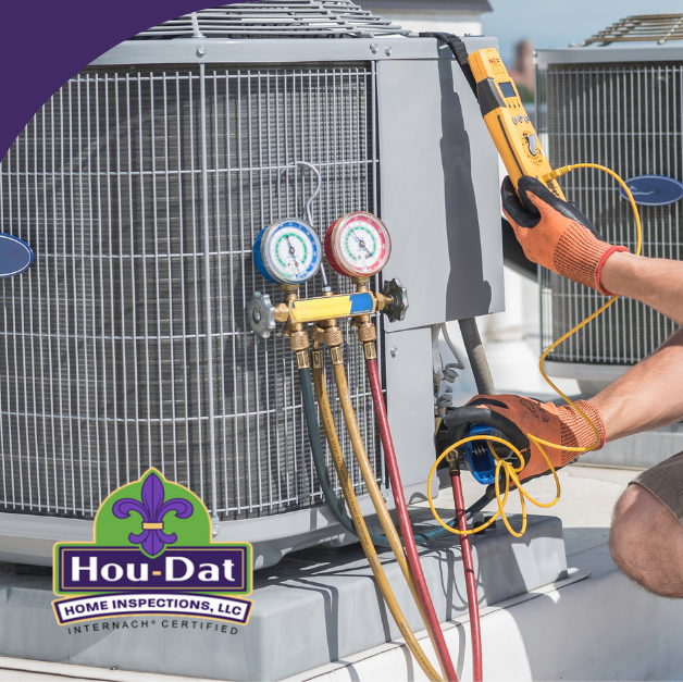 Technician using a multimeter and gauges to inspect an HVAC unit on a rooftop.